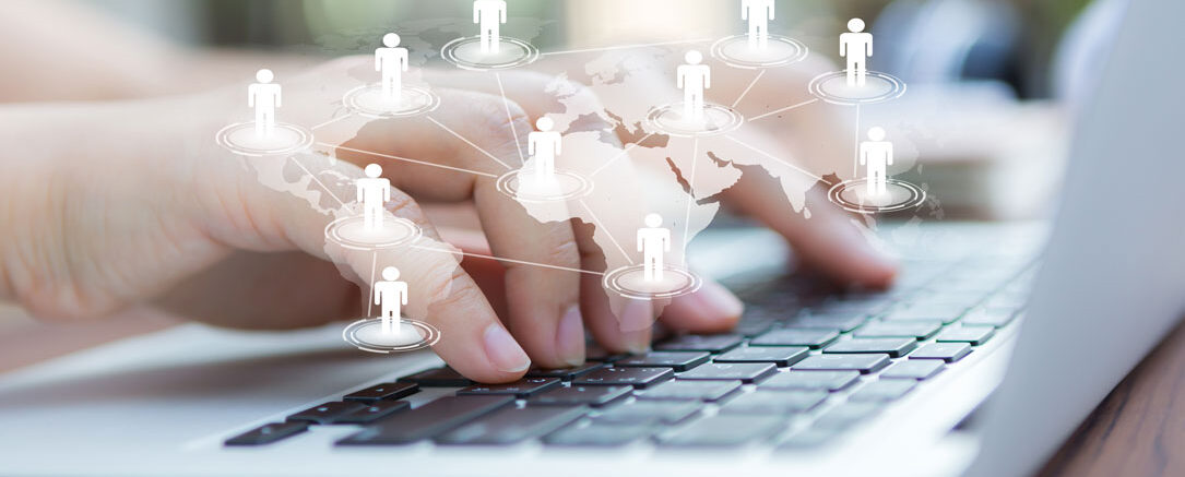 Closeup of business woman hand typing on laptop keyboard